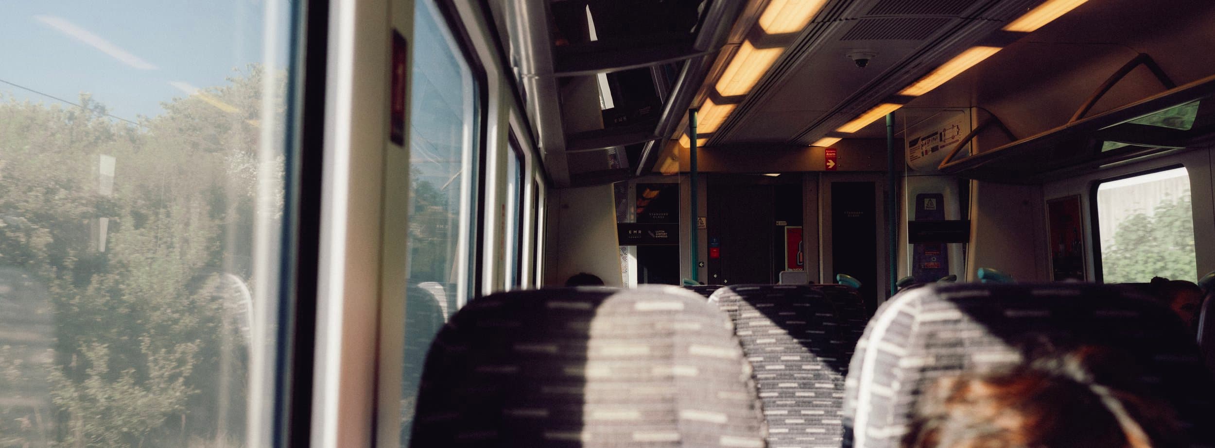 Interior shot of a bus with natural light, production still from Dinner's Ready